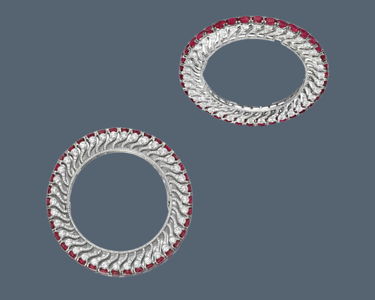A pair of traditional bangles with red stones