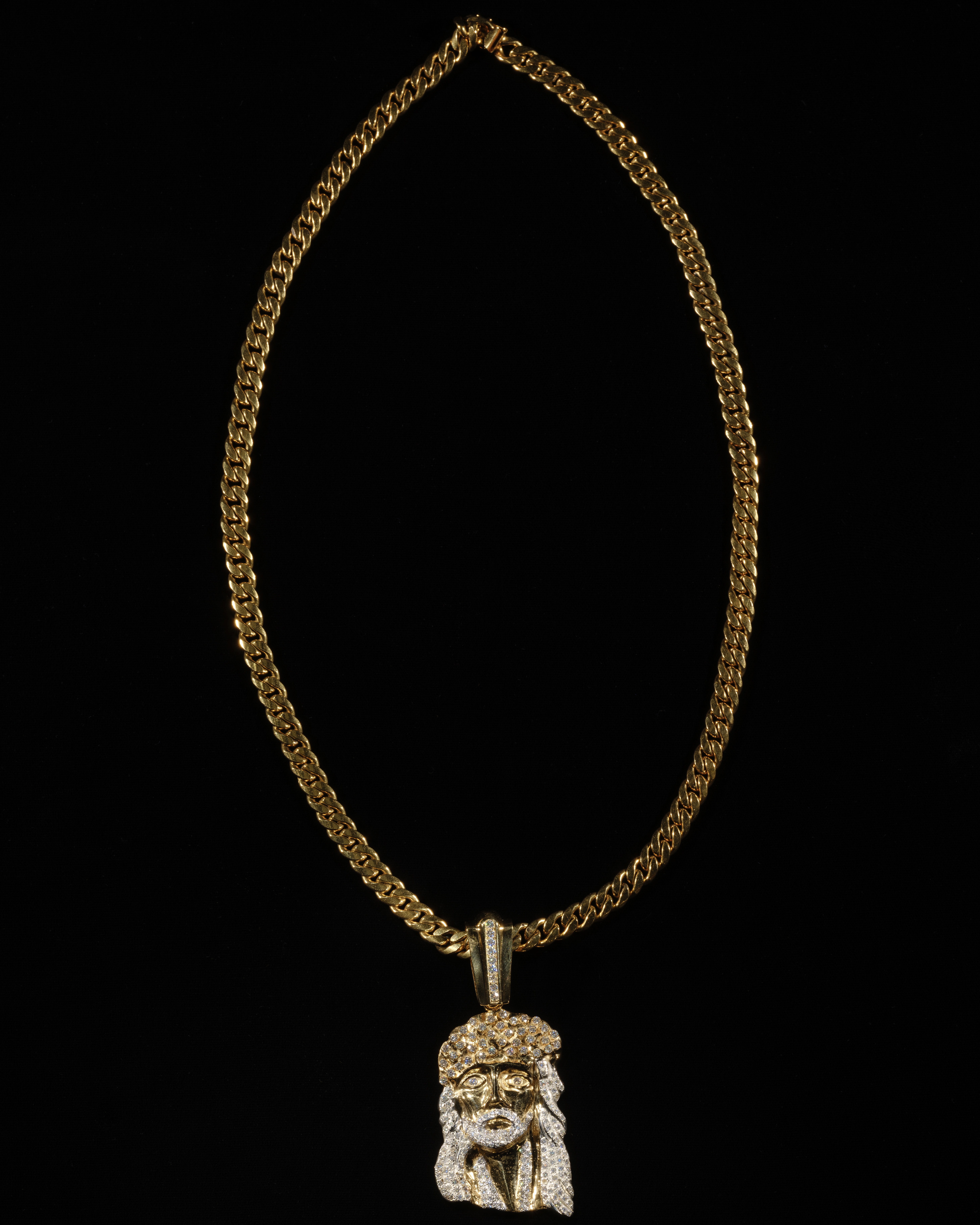 Gold chain with pendant necklace.
