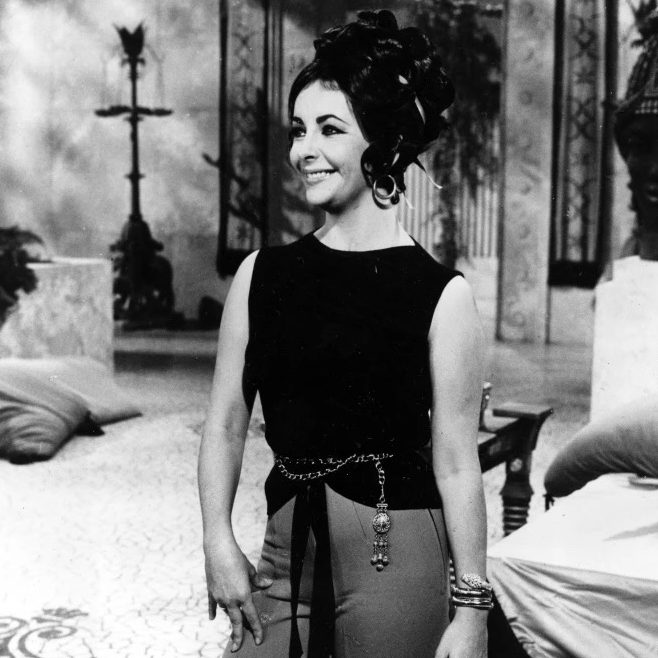 Elizabeth Taylor wearing a Bulgari 'Serpenti' watch while filming Cleopatra at Cinecitta Studio in Rome, 1962. (Courtesy of Bulgari)
