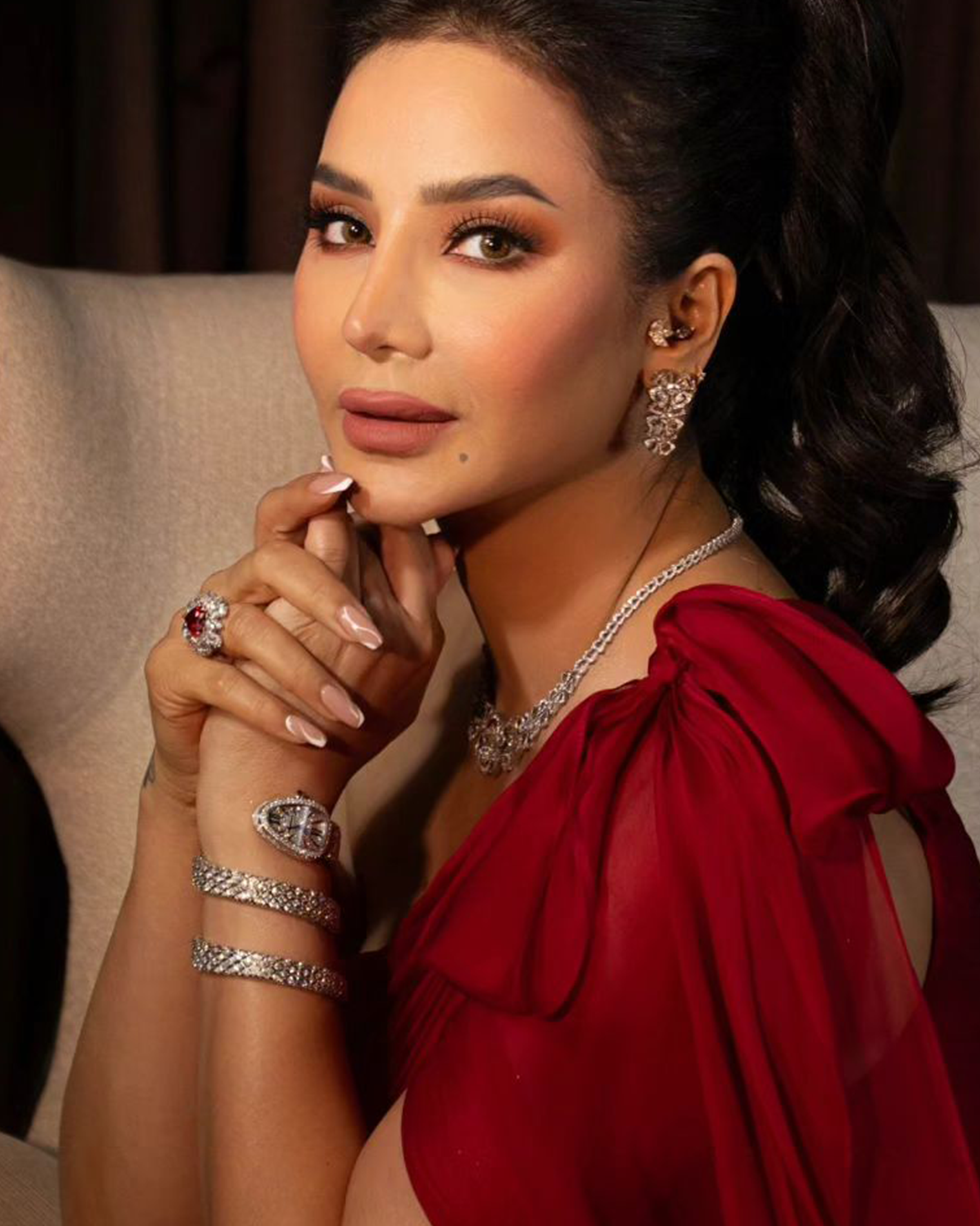 The Ultimate Diamond Flex: <i>Celebrities and Their Iconic Timepieces</i> 21 Lojain Omran wearing Bvlgari Serpenti Spiga diamond watch
