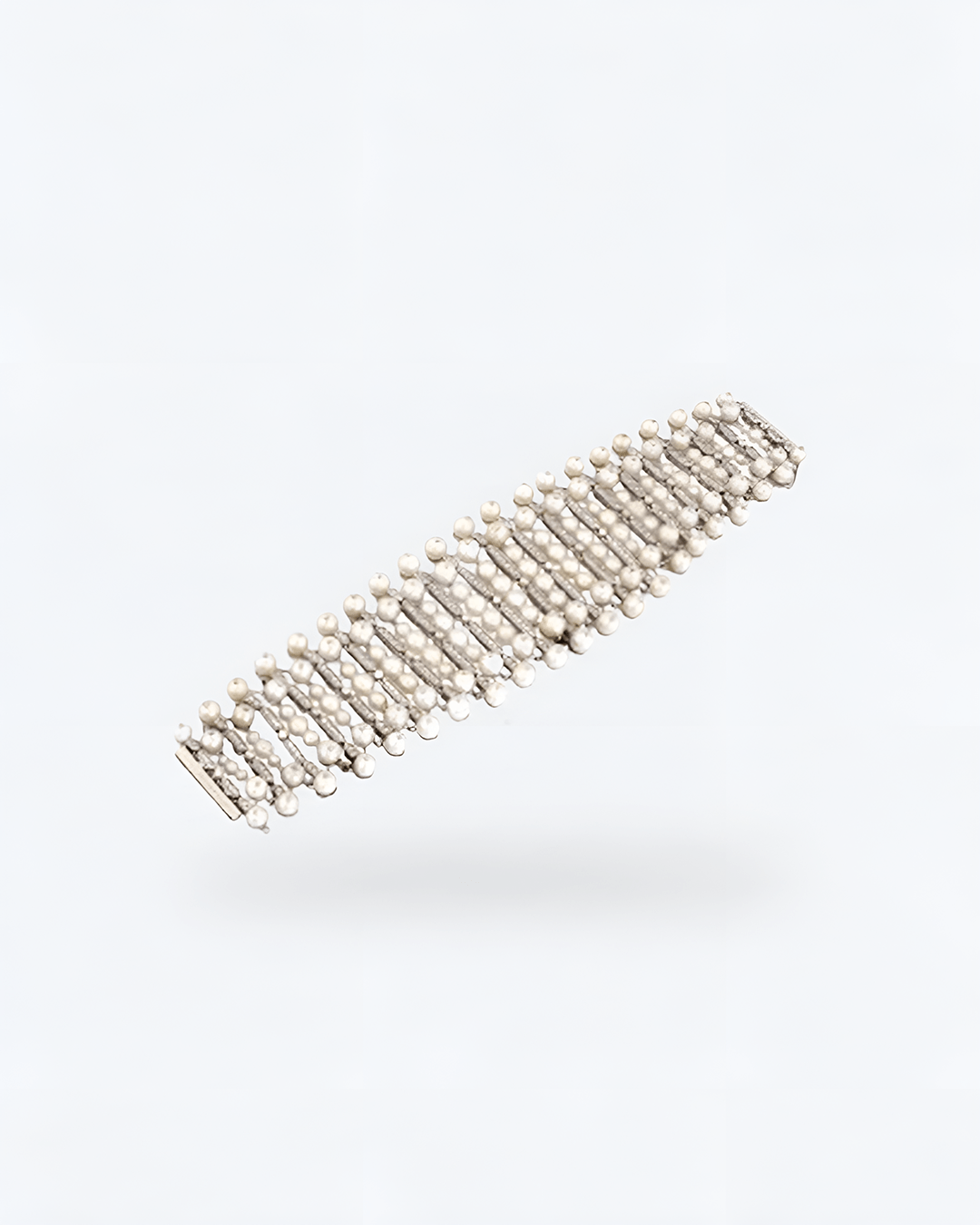 Maximalist cuff bracelet with rose-cut diamonds and pearls