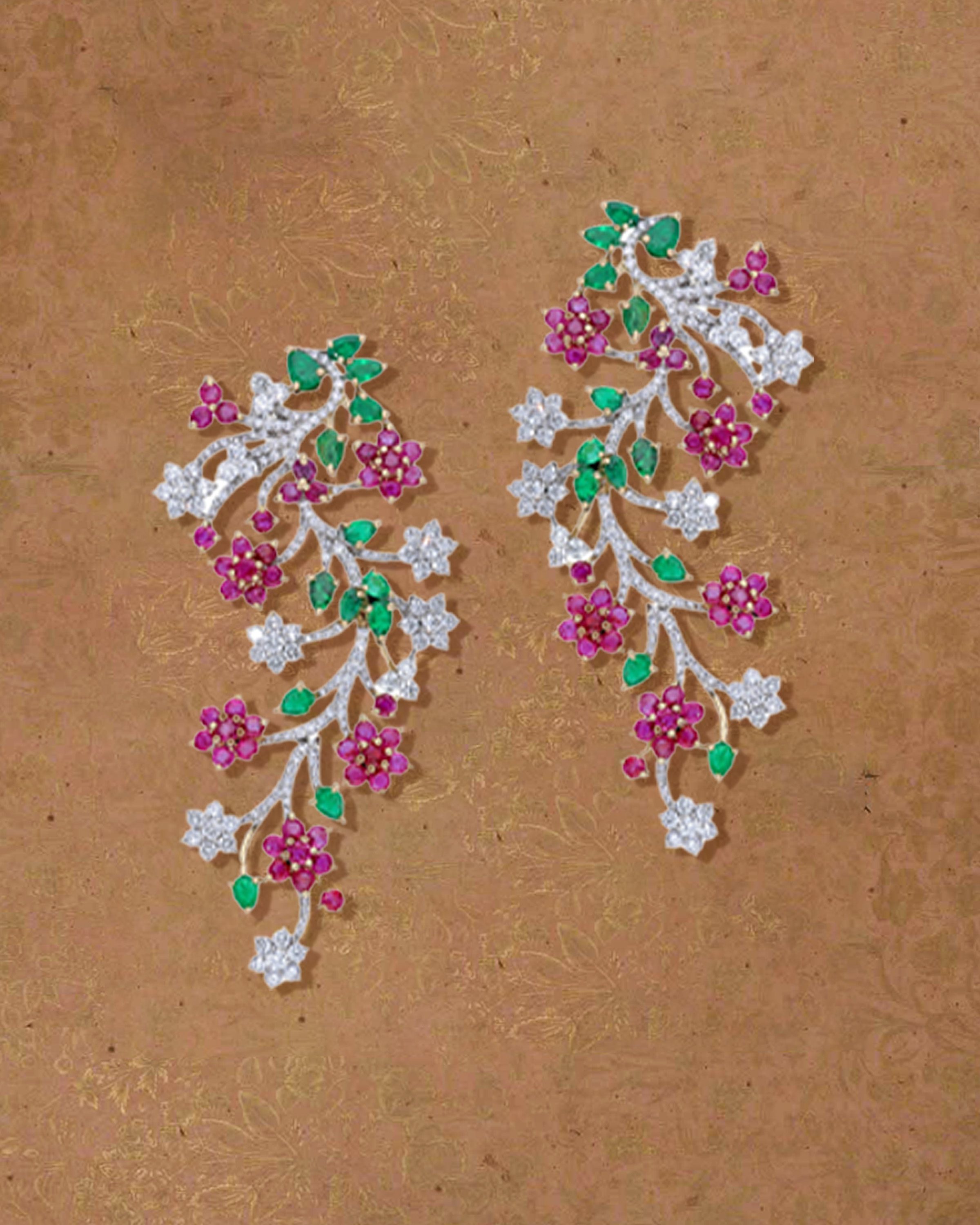 Bold contrast of diamonds, rubies, and emeralds 

 