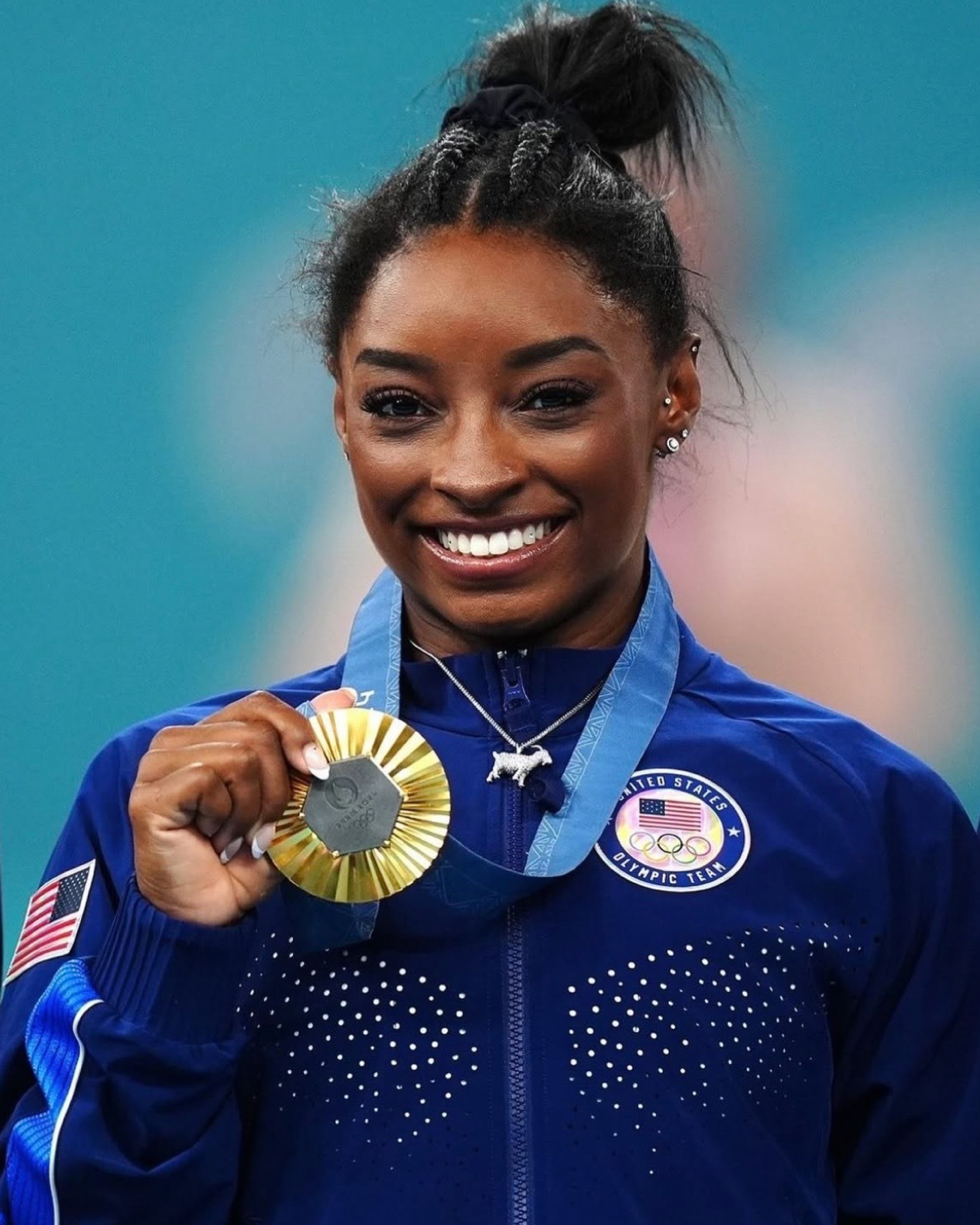 Of Grit And Glory, And The Women Who Can. 4 Simone Biles wears a diamond-studded GOAT pendant after winning Olympic gold