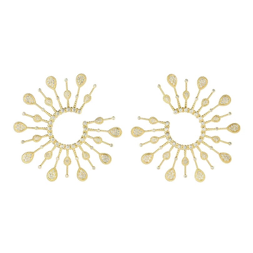 Boucheron Serpent Bohème Solarité Multi-motif Hoop Earrings, $56,400, boucheron.com
