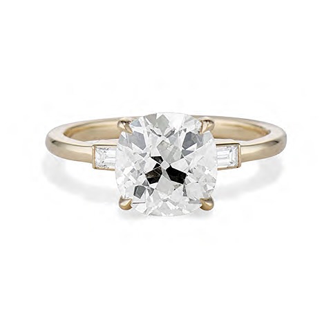 Why a Hidden Halo Engagement Ring Is the Ultimate in Understated Luxury 3 a diamond ring with a hidden halo setting