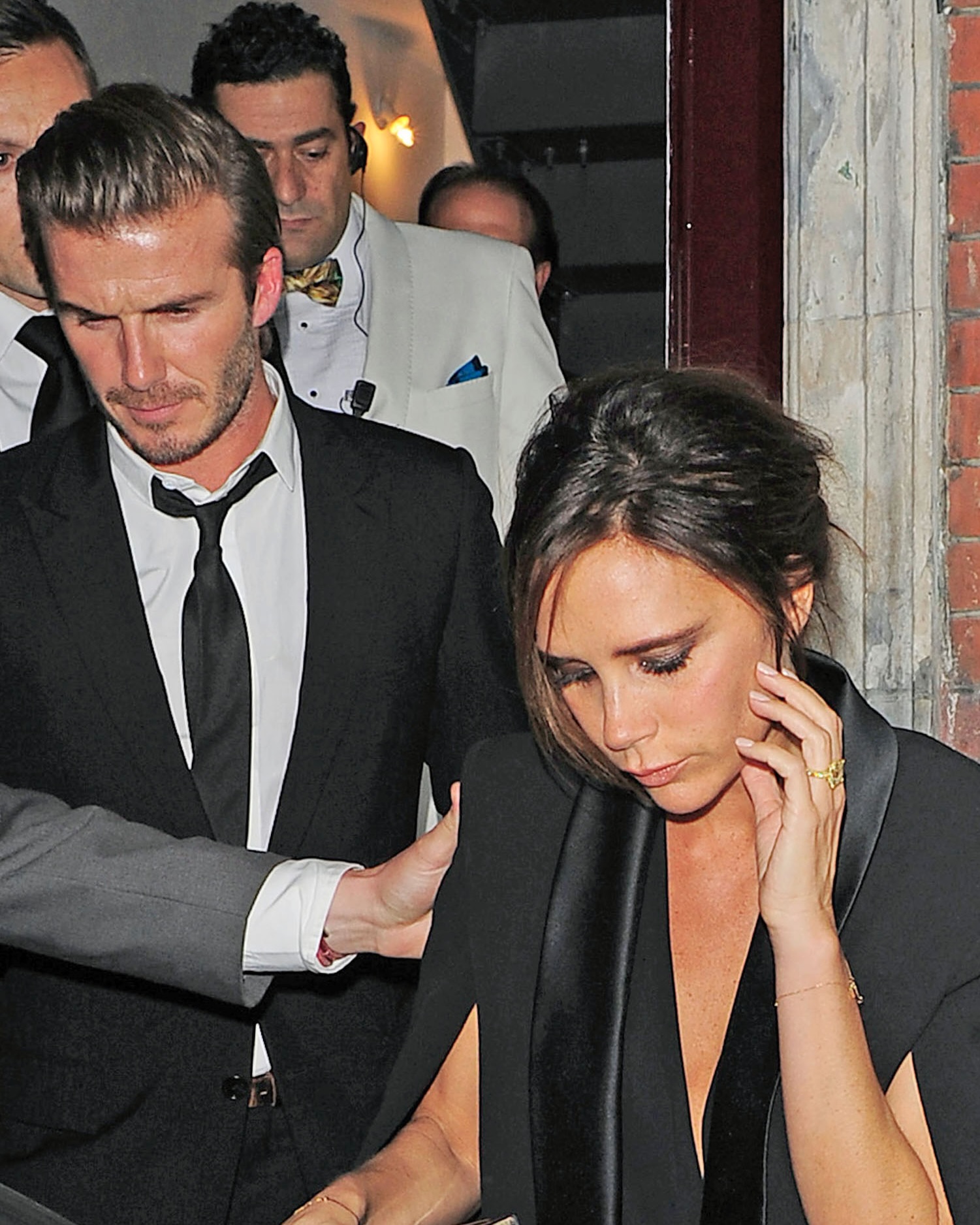 Victoria Beckham is seen wearing her yellow diamond ring on a night out with her husband, David