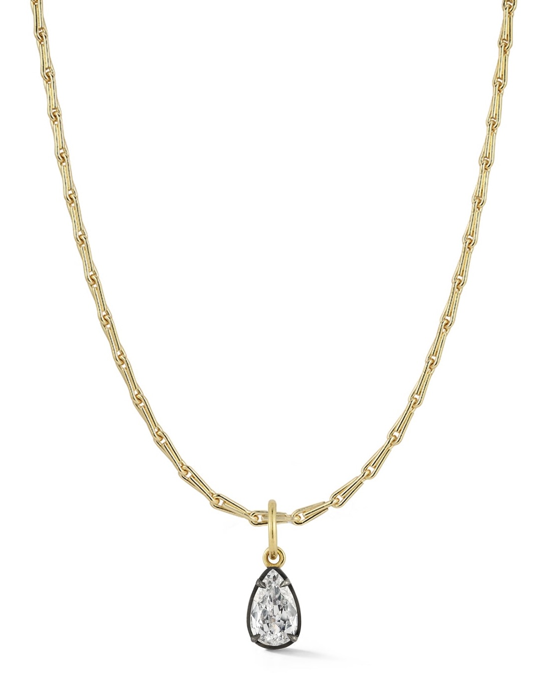 Sarah Jessica Parker as Carrie Bradshaw in 'And Just Like That' wearing the a pear shaped diamond necklace from Jemma Wynne. 