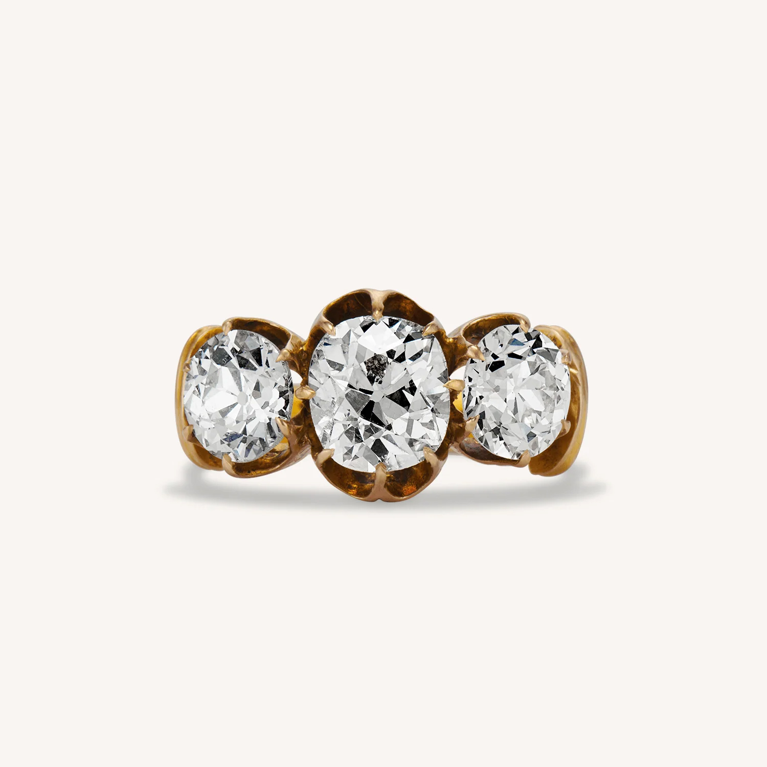 old mine cut diamond three stone ring