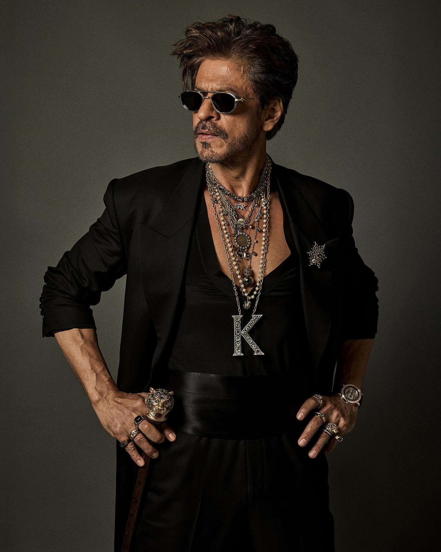 Shah Rukh Khan in Sabyasachi diamond chains, SRK pendant, and Bengal Tiger Head Cane.