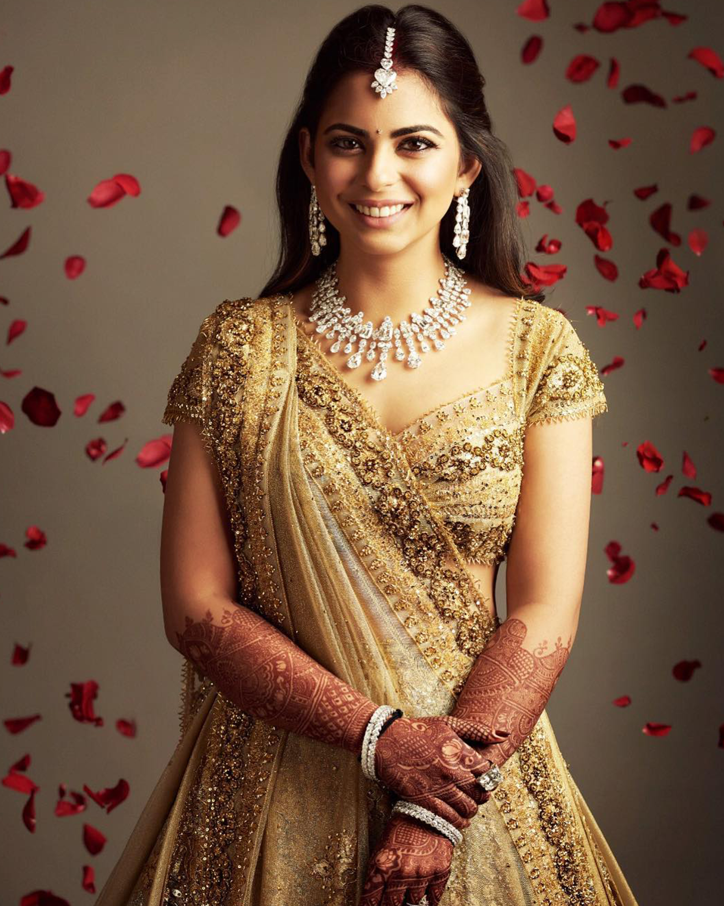 Isha Ambani in diamond necklace, drop earrings and maang tikka