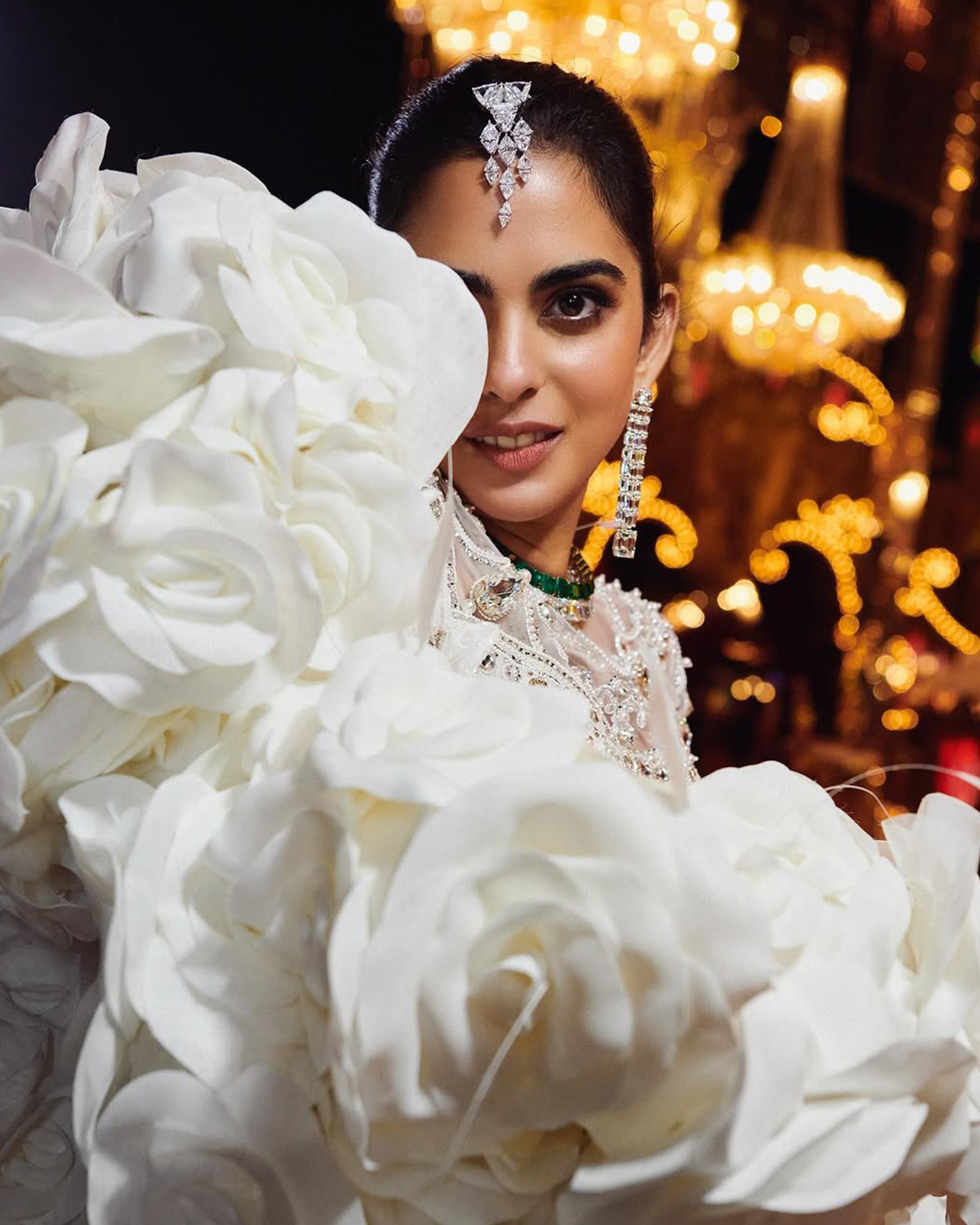 Isha Ambani’s Diamond earrings and a statement maang tikka at Anant Ambani's pre-wedding event