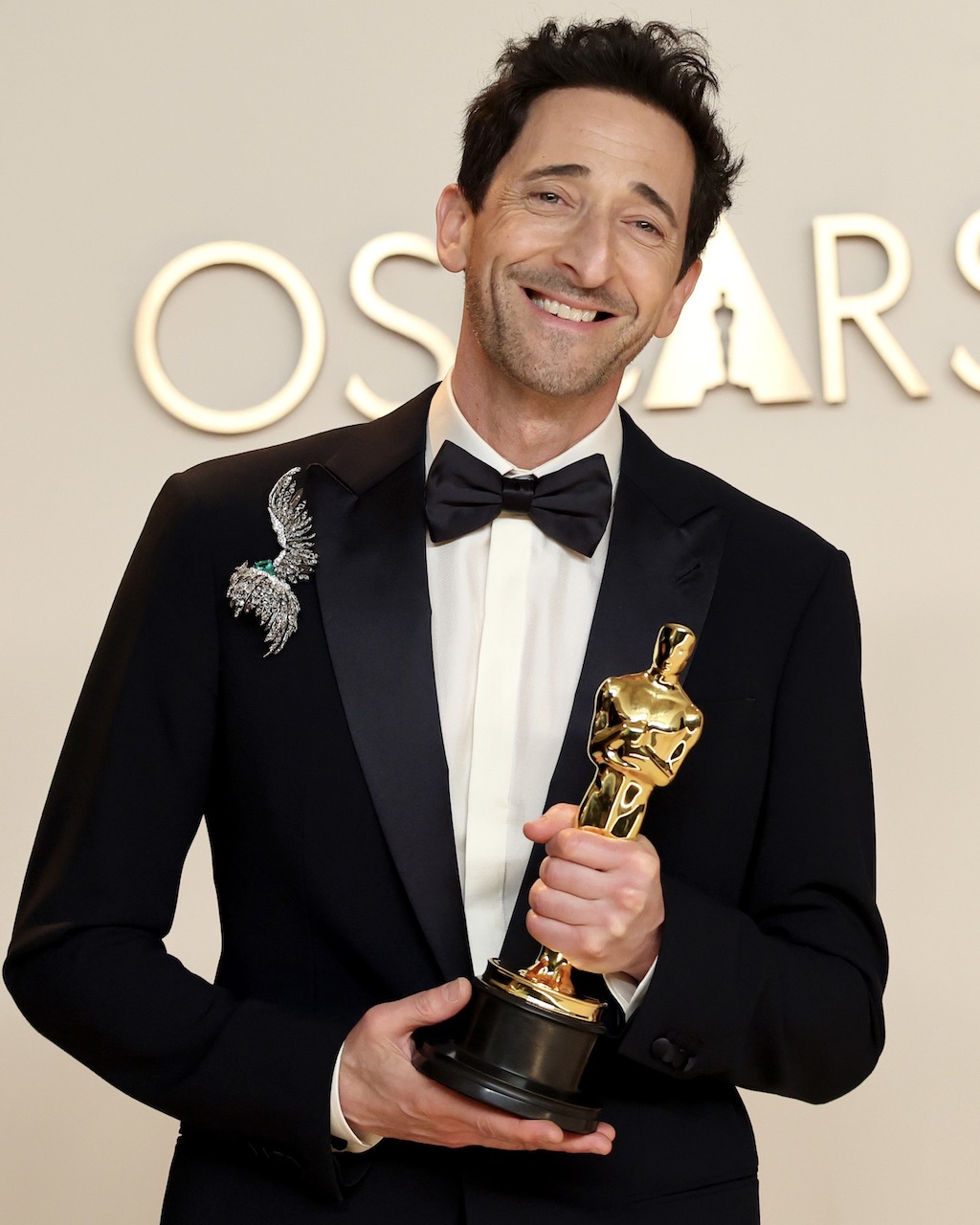 Pump Up The Volume With Maximalist Jewelry 3 Adrien Brody wears a maximalist diamond brooch at the 2025 Oscars, where he won Best Actor in a Leading Role for “The Brutalist."