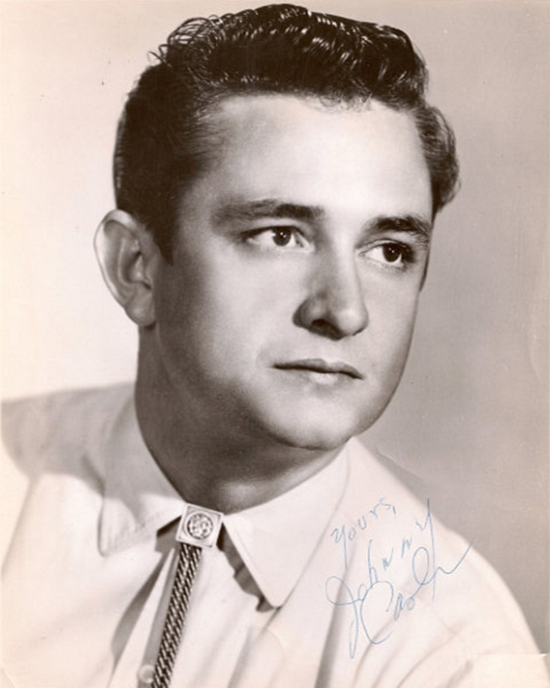 Country singer Johnny Cash wearing a diamond bolo tie in a promotional photo for Sun Records, 1955. (Wikimedia Commons / Public Domain)