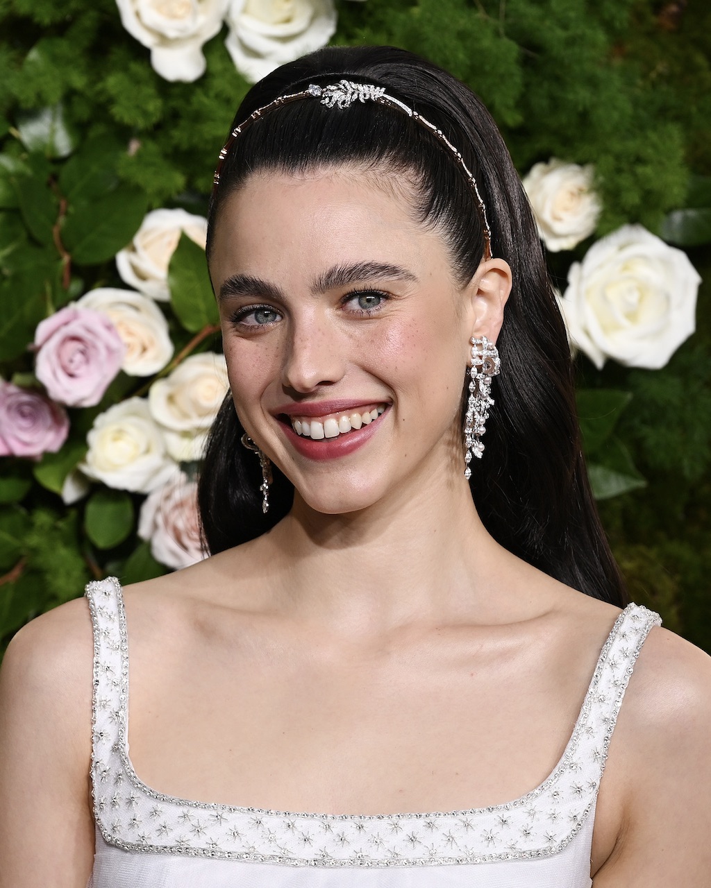 Margaret Qualley wears Chanel diamond jewelry at the 2025 Golden Globes