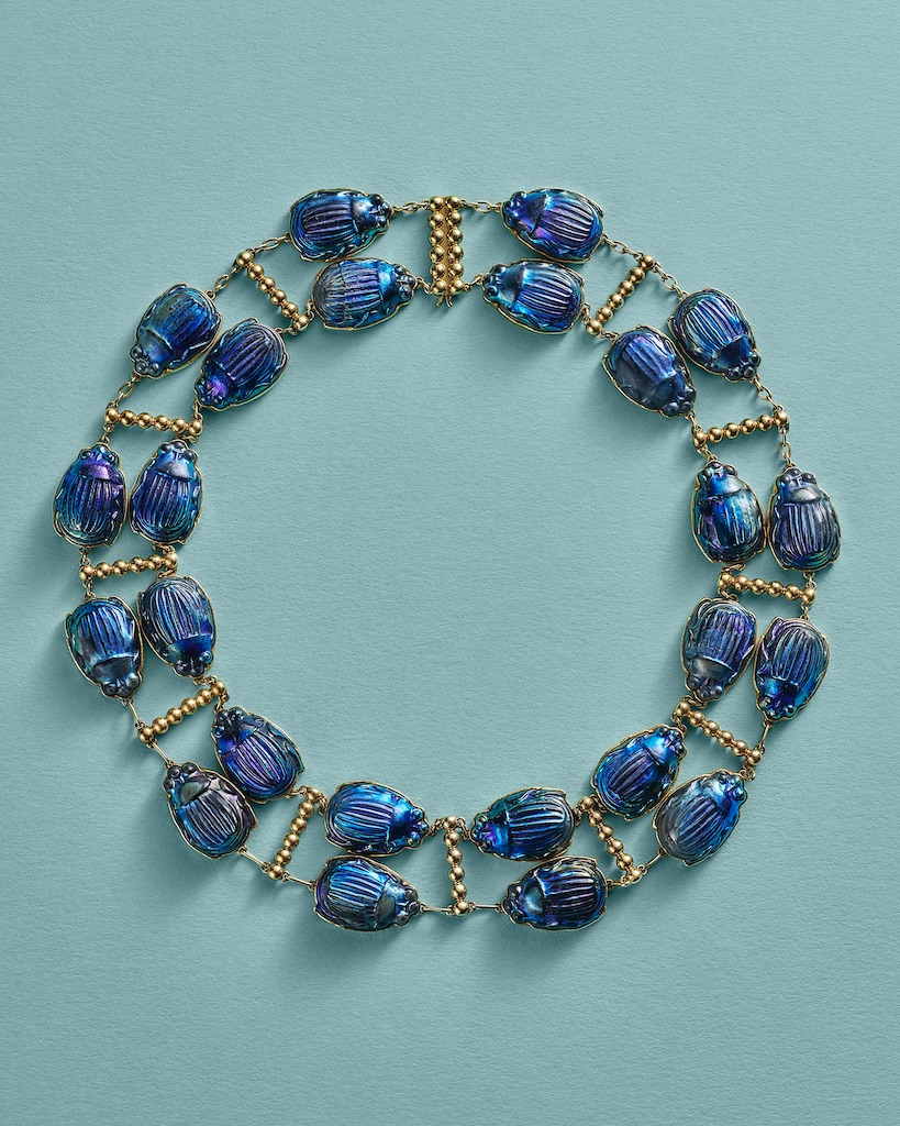 Mia Goth will wear the Tiffany & Co. Archive Favrile Glass Scarab Necklace by Meta Overbeck, circa 1914, in Frankenstein. 