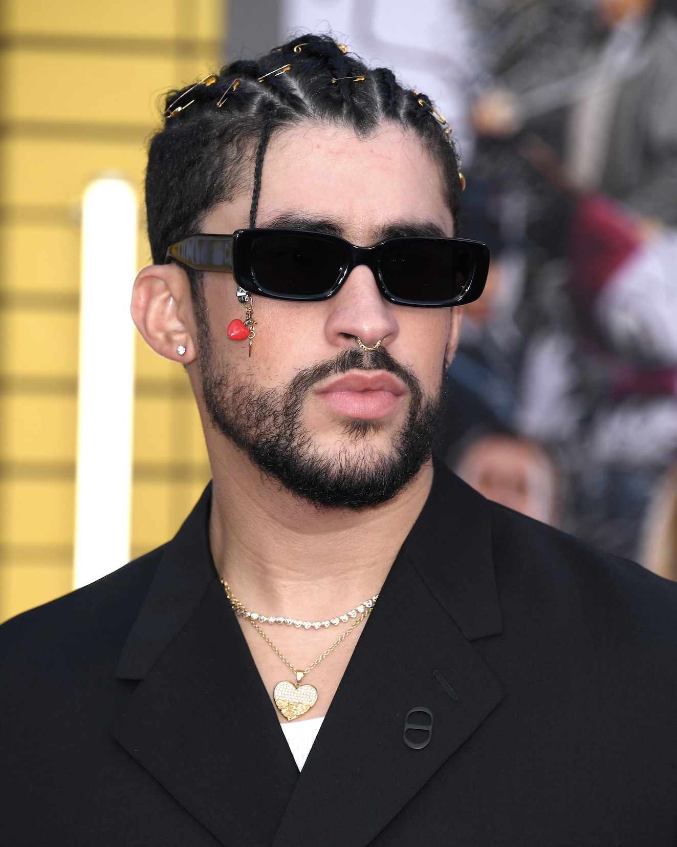 How Bad Bunny Wears Jewelry with Intention, According to His Stylist 9 Bad Bunny Wore Marvin Douglas Jewels at the 2022 Bullet Train Premiere