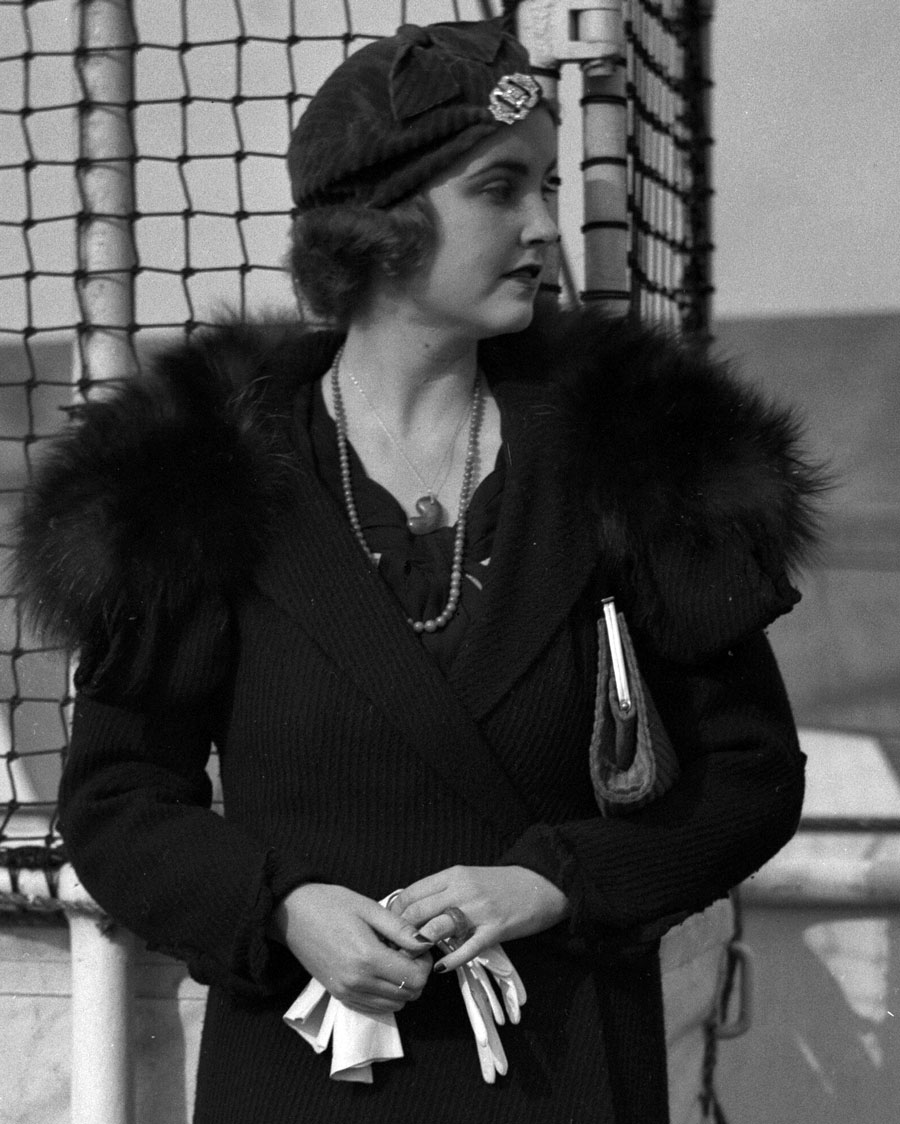 Barbara Hutton poses on a ship.