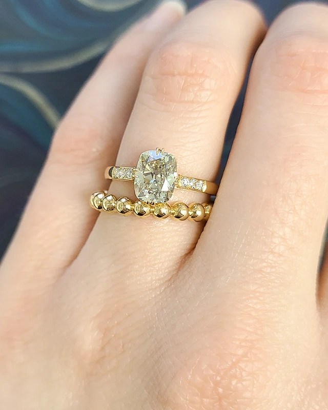 Affordable engagement ring: SIngle Stone Bauer Ring with antique cushion cut center stone. (Courtesy of Single Stone)