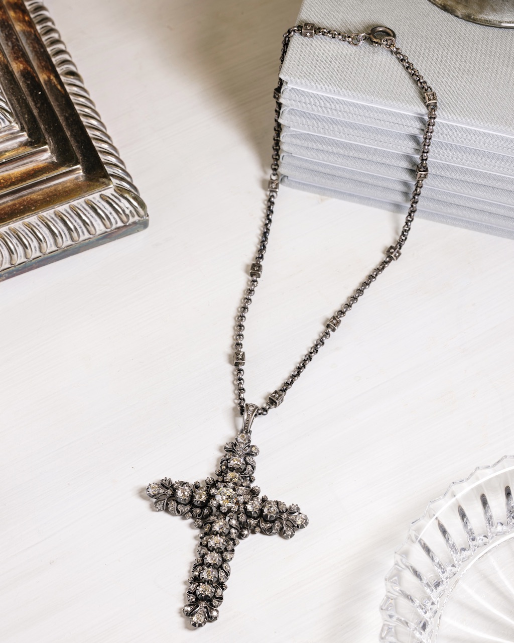 Rihanna wears diamond Briony Raymond diamond cross necklace in new street style moment