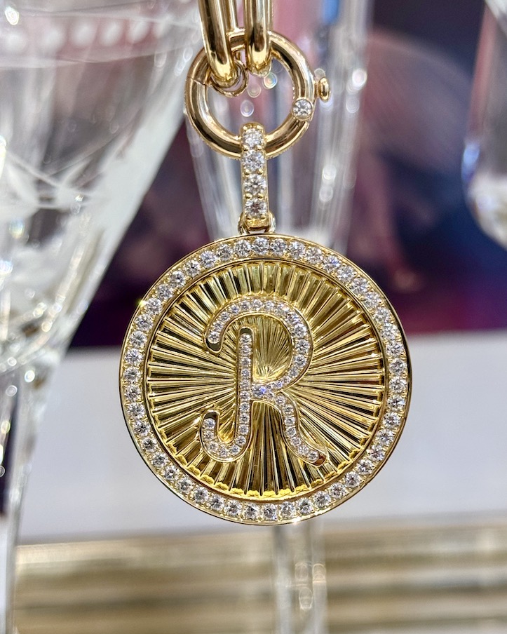 Rihanna wears diamond Briony Raymond initial necklace in new street style moment 