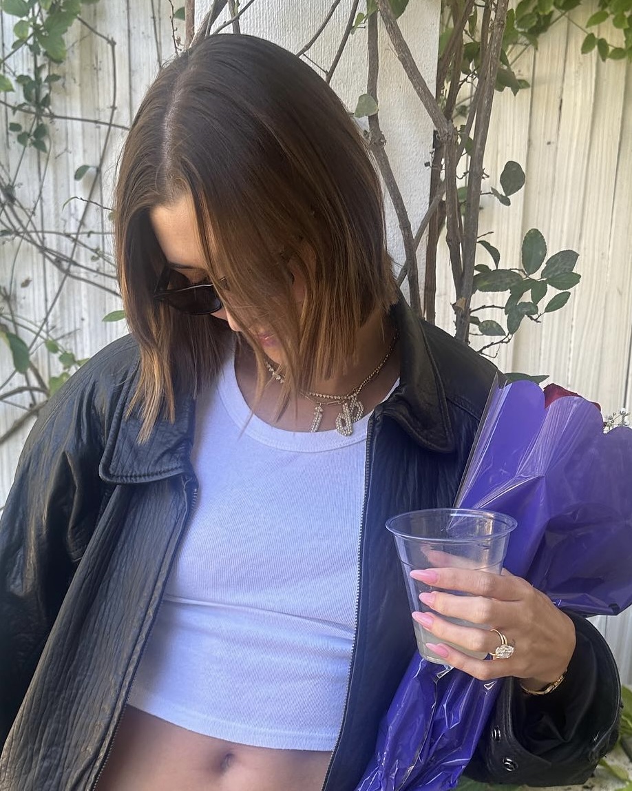 Hailey Bieber wears her Jennifer Fisher Fixed Large Gothic Monogram Letter necklace in honor of Justin Bieber. (Instagram: @haileybieber)