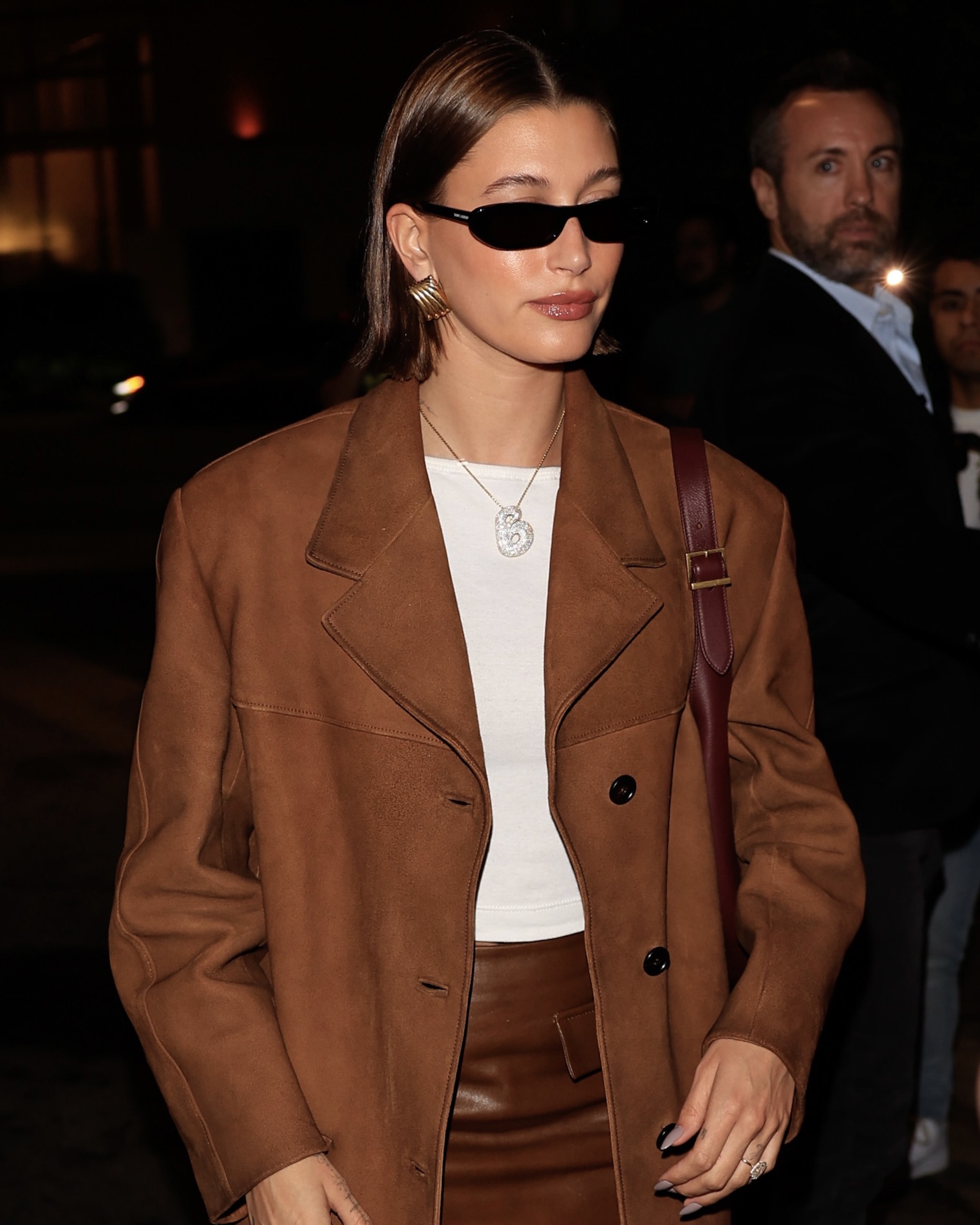 Hailey Bieber is seen wearing her Alex Moss "B" initial necklace in Los Angeles street style moment