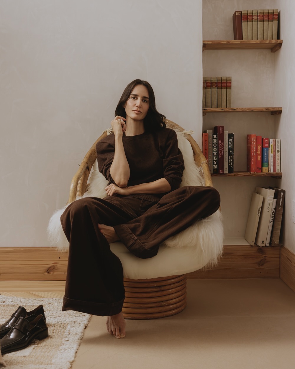 Ana Khouri rings featuring white diamonds and 18K Fairmined gold. Stella McCartney top and pants, Khouri’s own shoes.