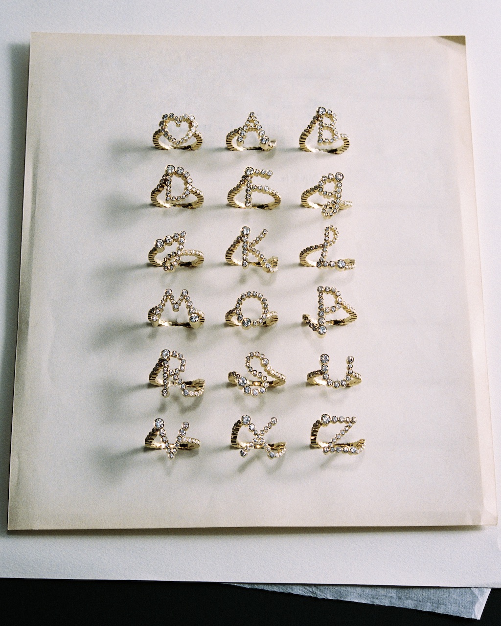 Sophie Bille Brahe's Lettre de Lumière collection includings natural diamond initial ring, rendered in the designer's own handwriting.