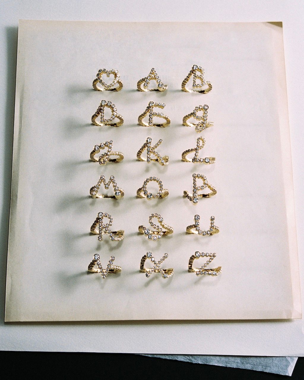 Sophie Bille Brahe's Lettre de Lumière collection includings natural diamond initial ring, rendered in the designer's own handwriting.