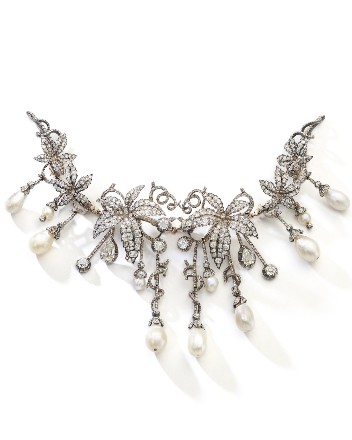 A Rare and Historically Important Natural Pearl and Diamond Hair Ornament and a Brooch