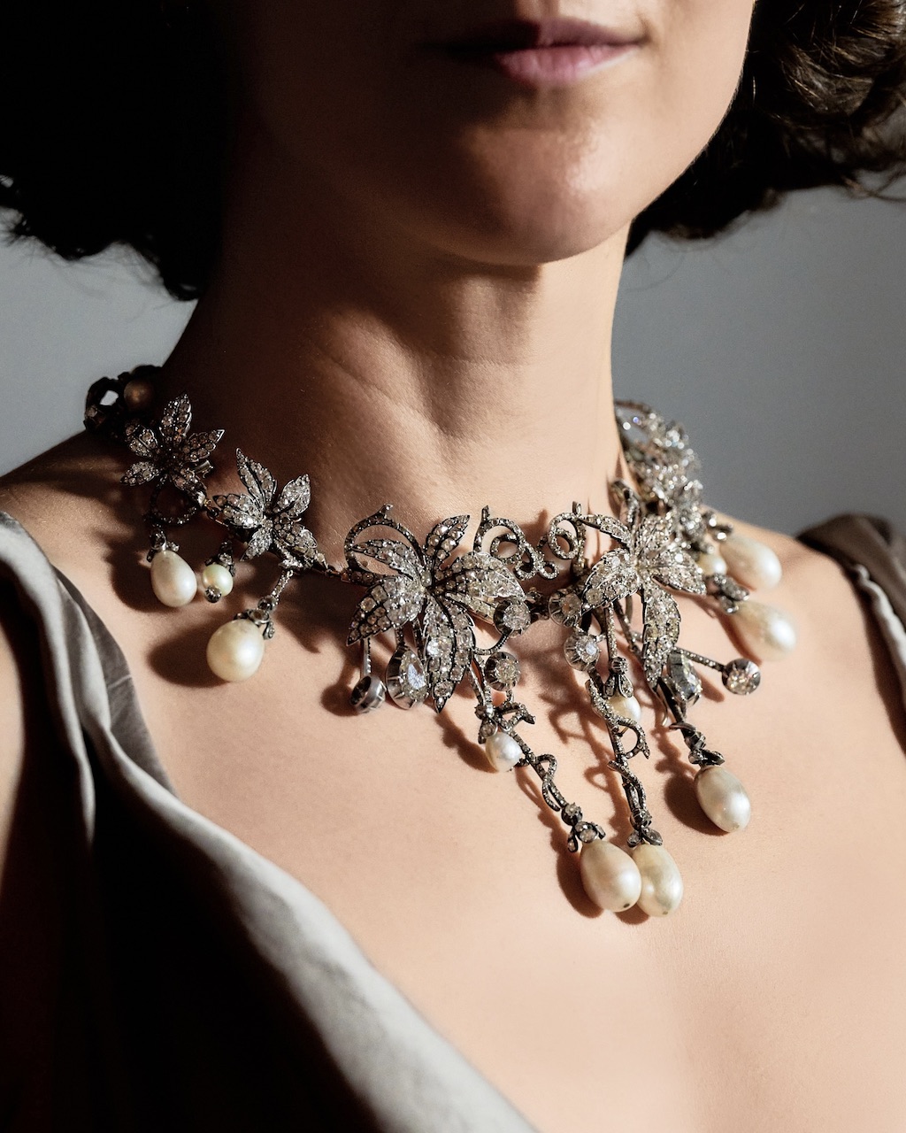 A Rare and Historically Important Natural Pearl and Diamond Hair Ornament and a Brooch