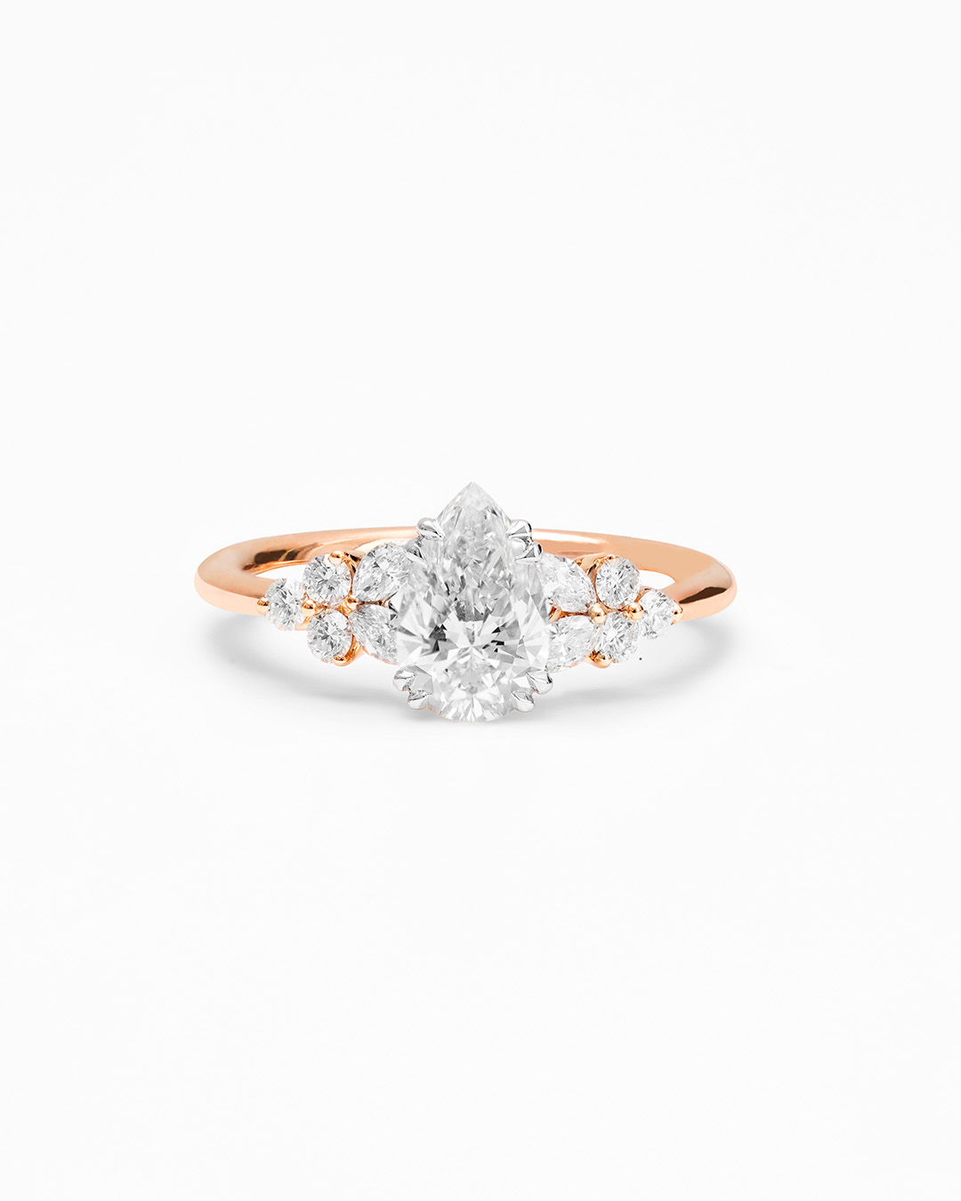 Rose gold pear-shaped diamond engagement ring