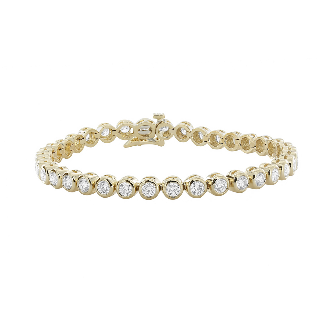 16 Gift Ideas from London Jewelers That Are Sure to Wow Everyone on Your List 13 London Jewelers yellow gold tennis bracelet