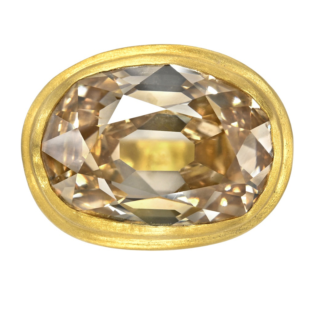 One-of-a-kind fancy orange brown diamond engagement ring featuring antique diamond cuts