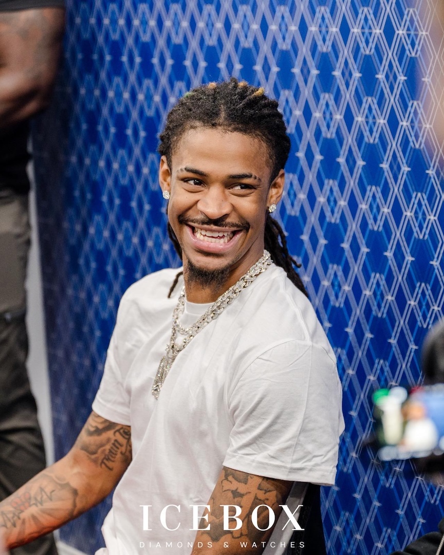 Ja Morant wearing his custom logo pendant