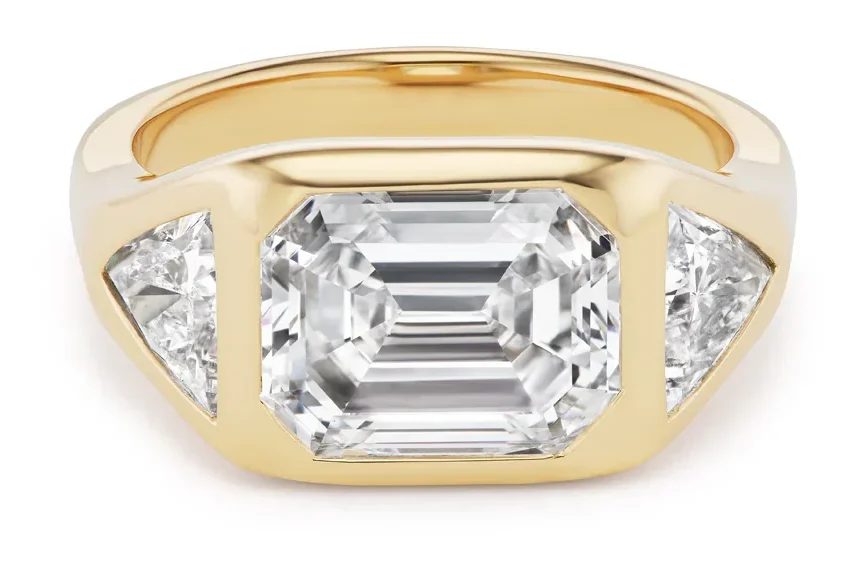 three stone ring with trillion cut diamond side stones