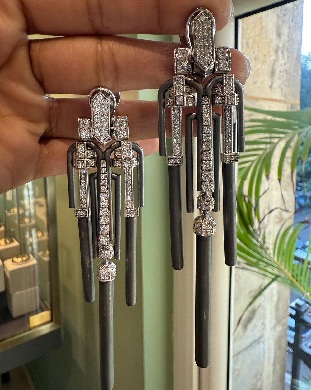 Image alt text- Modern colour contrast diamond earring