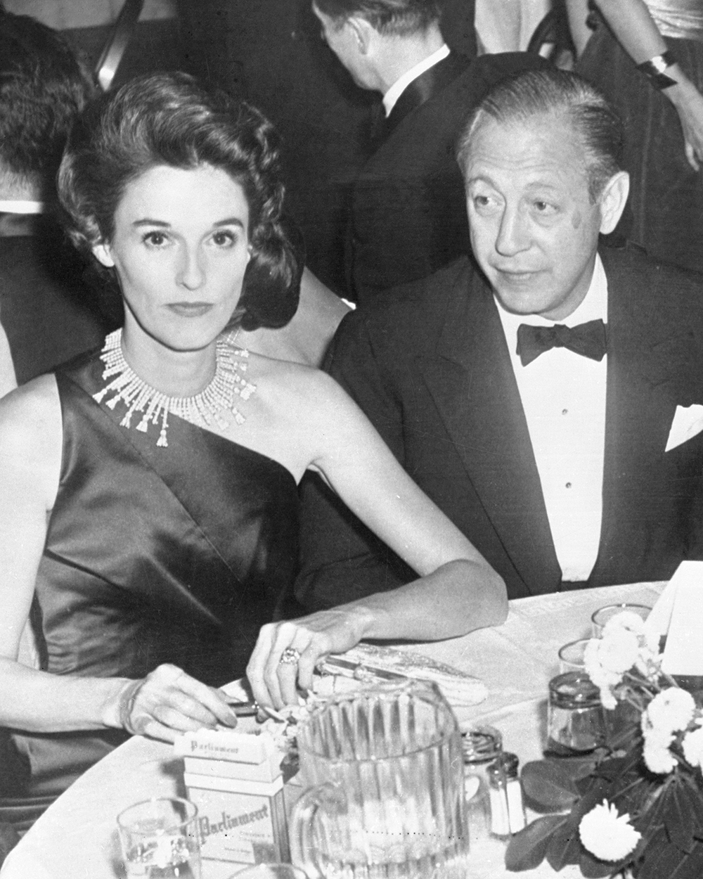 Babe Paley attends the sixth annual North Shore Hospital Ball in O'Hara Hall of the U.S. Merchant Marine Academy at Kings Point, wearing a 21-carat canary diamond ring by Verdura, c. 1955. (Getty Images)