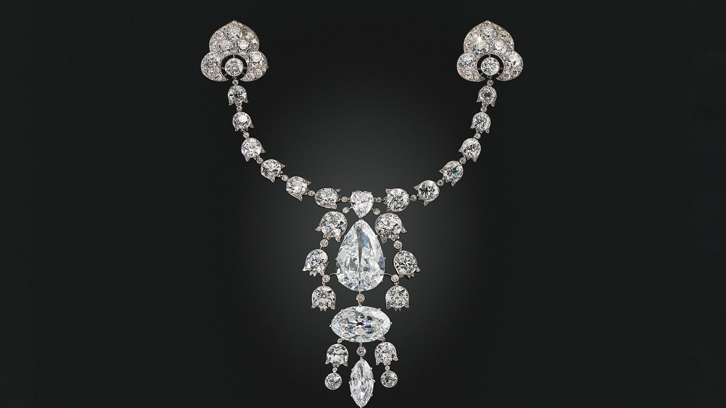 jewelry auctions: Cartier Belle Époque diamond devant-de-corsage brooch set with Golconda diamonds 