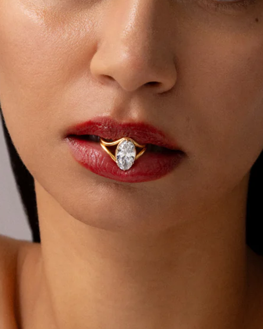 split shank engagement rings: split shank engagement ring in woman's mouth 