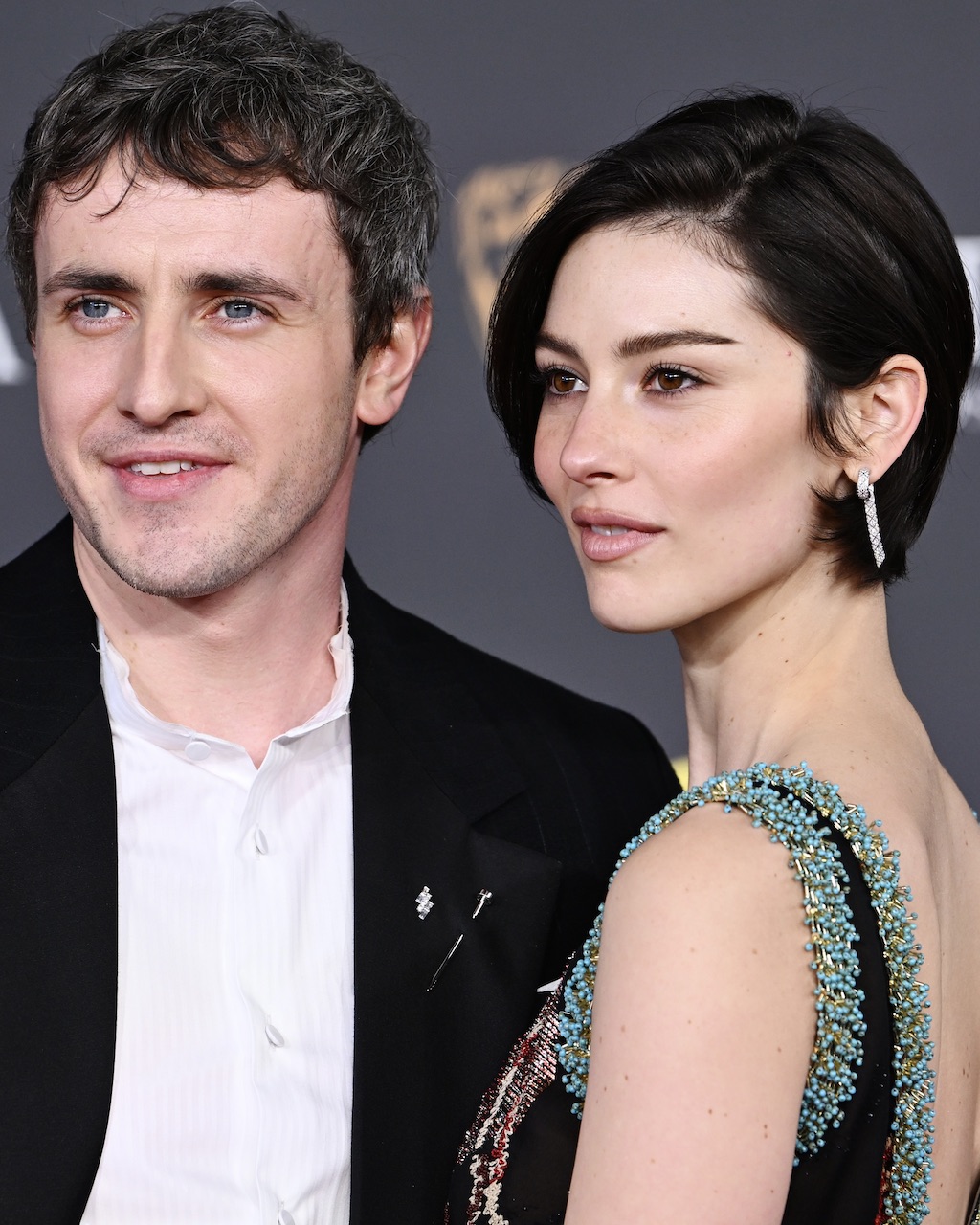 Paul Mescal and Gracie Abrams attends the BAFTA Awards 2026 in diamond jewelry