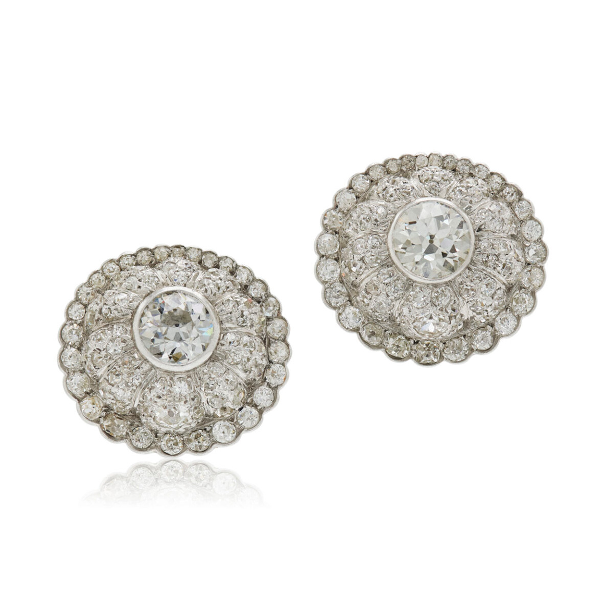 Diamond Scallop Cluster Earrings by Suzanne Belperron, $196,000, fredleighton.com