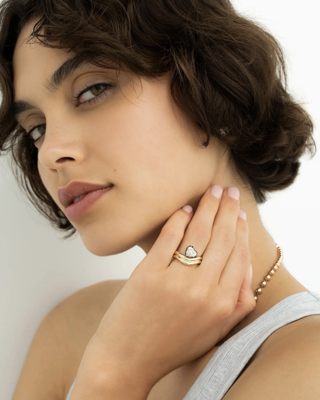 Jessica McCormack 1.54ct Tilted Heart Shaped Diamond Wave Ring, $56,000, jessicamccormack.com