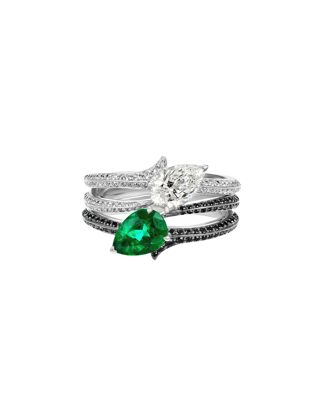 Stacked diamond rings with pear-shaped white and green gemstone center stones