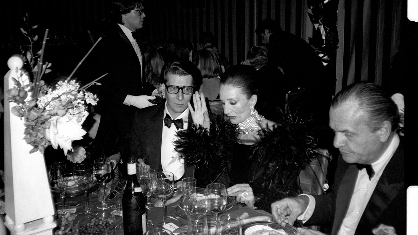 Yves Saint Laurent, Countess Jacqueline de Ribes, and Bill Blass at the Costume Institute's Met Ball Benefit held at the Metropolitan Museum of Art, 1983. (Photo by Patrick McMullan/Getty Images)