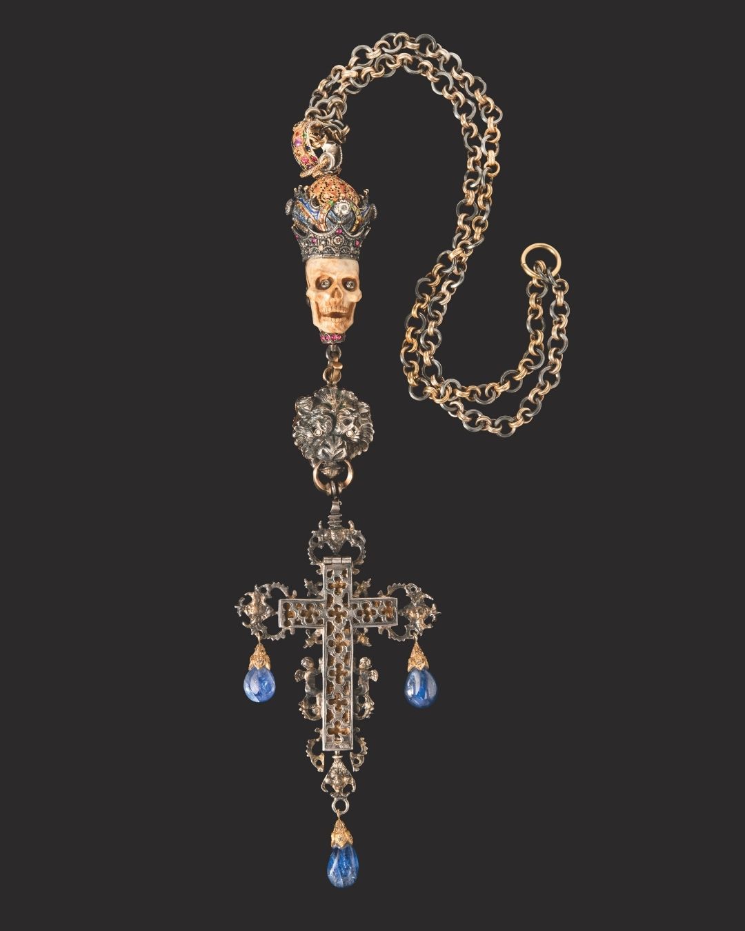 A. Codognato necklace with a crowned skull, lion’s head and cross pendant 18-karat yellow gold and silver, diamonds, sapphires, rubies, semi- precious stones and rock crystal. (Courtesy of A. Codognato)