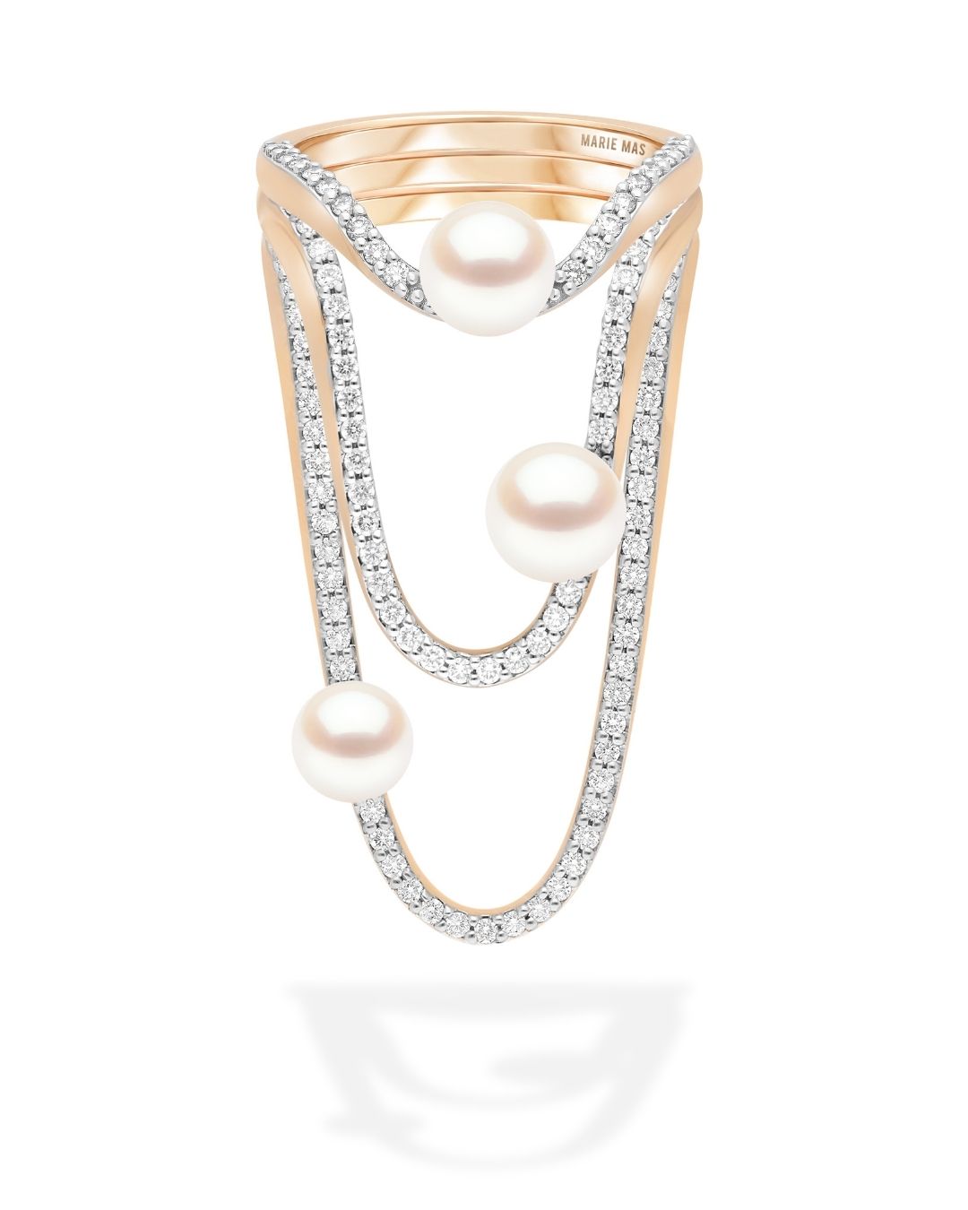 Paris Fashion Week: Marie Mas 18K rose gold Paloma ring stack featuring the Halo, Radiant, and Aurora with diamonds and Akoya pearls.(Courtesy of Marie Mas)