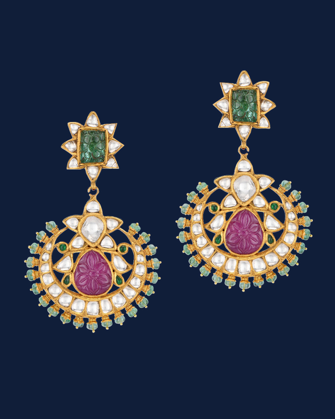Gold chandbali earrings with pink gemstone