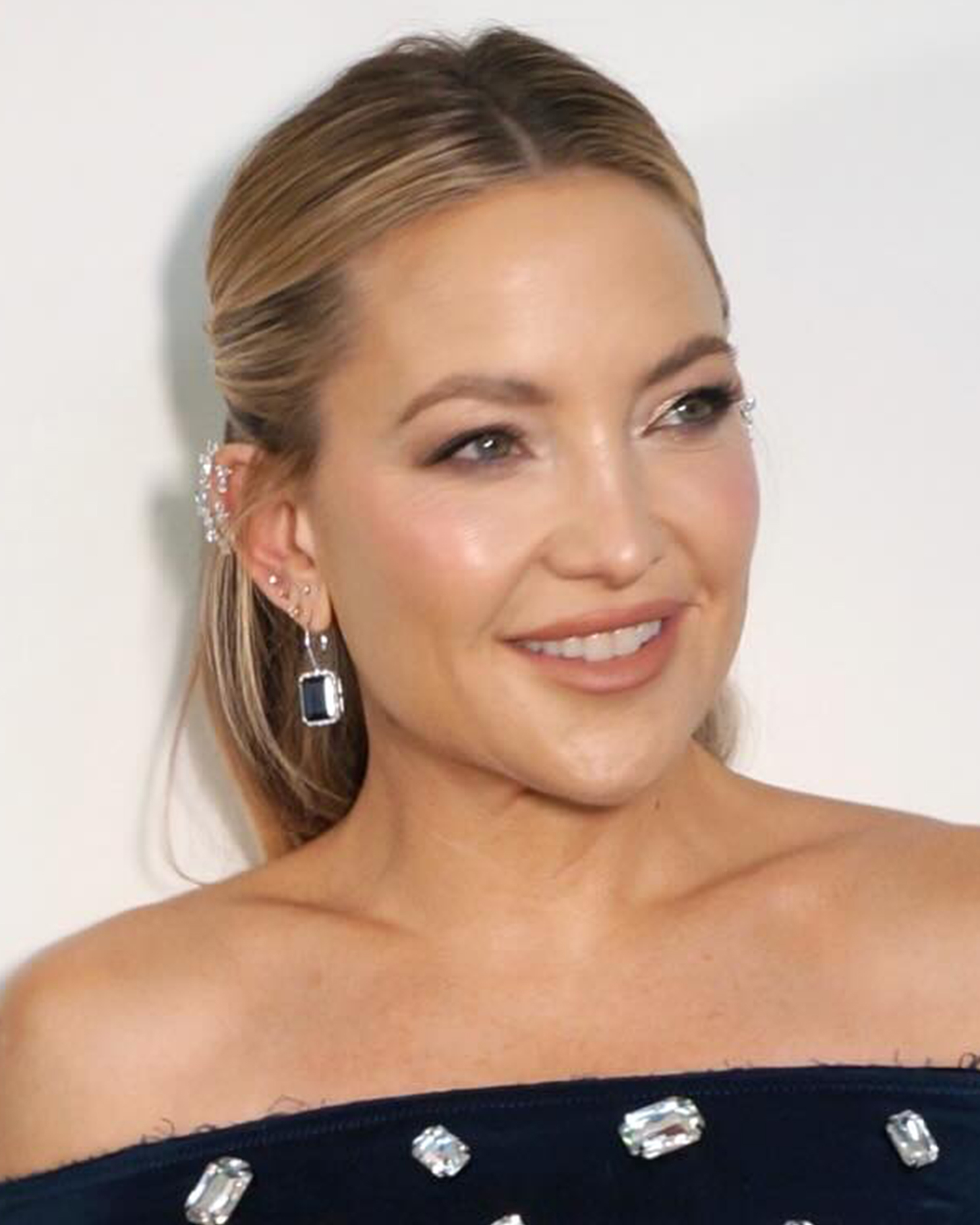 Sleek diamond ear cuff paired with modern drop earring