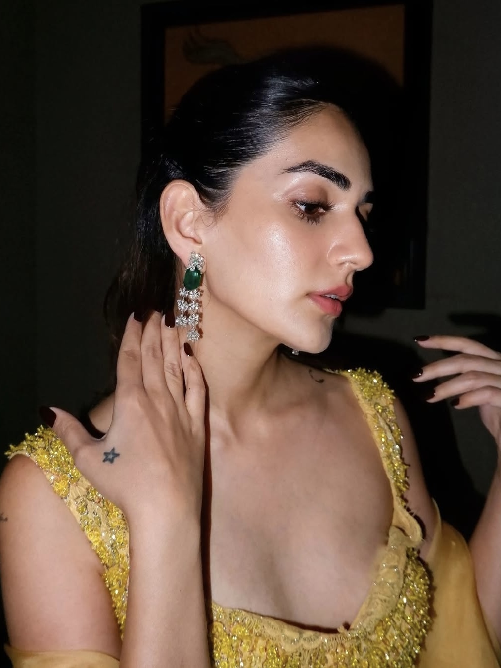 Statement diamond earring with emerald